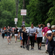 People wait in line to vote in Georgia’s primary election at Park Tavern on Tuesday, June 9, 2020, in Atlanta.